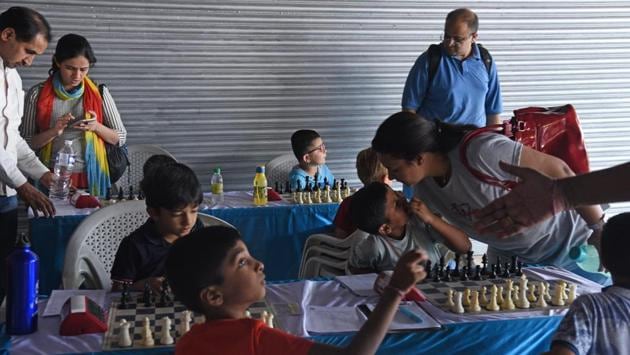 The players competing here are champions of district-level tournaments. The top two winners in boys and girls category will represent Maharashtra in the under-7 national chess tournament to be held in West Bengal on June 1-6 (Pratham Gokhale/HT Photo)