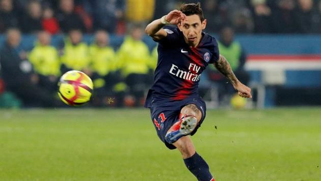 Paris St Germain's Angel Di Maria scores their third goal from a free kick(REUTERS)