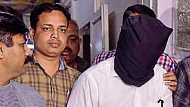 The Azad Maidan police on Monday arrested Neeraj Desai, the structural auditor who had certified Himalaya Bridge near Chhatrapati Shivaji Maharaj Terminus (CSMT) — which collapsed last week — as “safe for use”.(Anshuman Poyrekar/HT)