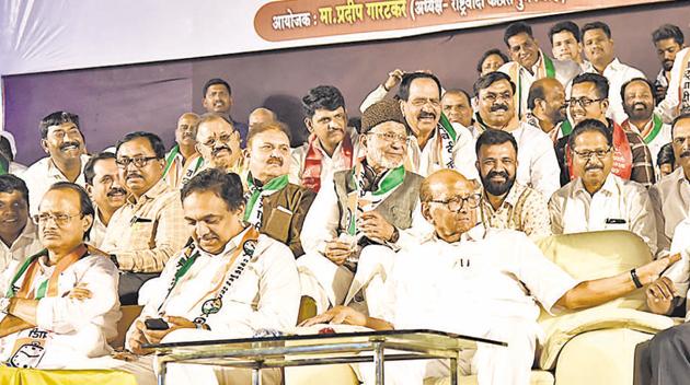 Sharad Pawar (centre) and Ajit Pawar (left), both NCP head honchos, wear at the political rally in Chinchwad on Sunday, to launch Parth Pawar’s poll campaign. (HT Photo) Sharad Pawar (centre) and Ajit Pawar (left), both NCP head honchos, wear at the political rally in Chinchwad on Sunday, to launch Parth Pawar’s poll campaign. (HT Photo)