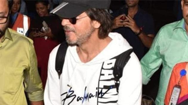 Shah Rukh Khan and AbRam outside Mumbai airport. (Varinder Chawla) Shah Rukh Khan and AbRam outside Mumbai airport. (Varinder Chawla)