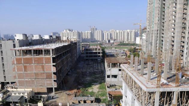 The Municipal Corporation of Gurugram (MCG) demolished six illegal under-construction structures, and sealed nine other illegal under-construction buildings at Rajiv Nagar on Monday. (Photo by Sunil Ghosh / Hindustan Times) (HT Photo) The Municipal Corporation of Gurugram (MCG) demolished six illegal under-construction structures, and sealed nine other illegal under-construction buildings at Rajiv Nagar on Monday. (Photo by Sunil Ghosh / Hindustan Times) (HT Photo)
