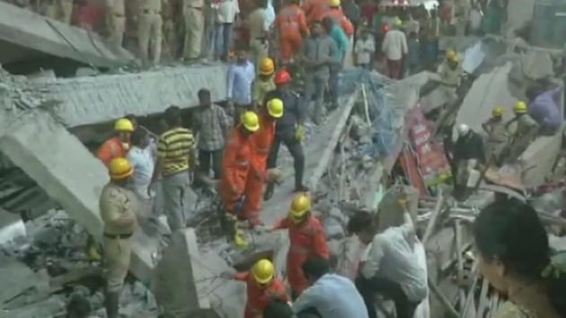 Three people were killed and several feared trapped after an under-construction building collapsed in Dharwad in north Karnataka.They added that 48 people have been rescued in overnight operations so far.(ANI Twitter)