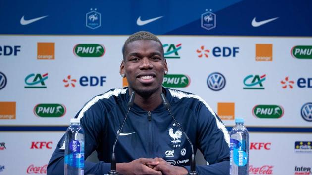 France's midfielder Paul Pogba attends a press conference in Clairefontaine-en-Yvelines, southwest of Paris(AFP)