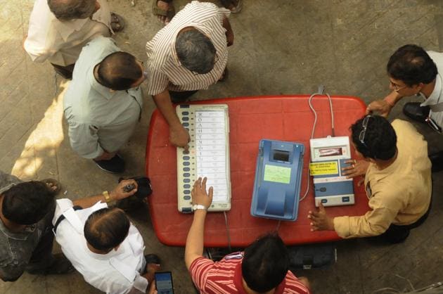 Kolkata, India - March 19, 2019: Directed by District Election Officer, as part of an awareness programme, officials show EVMs (Electronic Voting Machine) and VVPATs (Voter Verifiable Paper Audit Trail) to people near Shyambazar AV School, in Kolkata, West Bengal, India, on Tuesday, March 19, 2019.(Samir Jana / Hindustan Times)