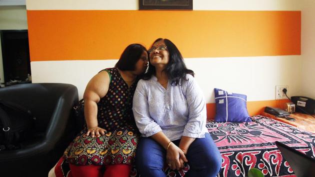 Aditi Verma (L) with her mother Reena Verma at their home in Mumbai. Born with Down syndrome, 24-year-old Aditi runs a cafe in Navi Mumbai’s Bhoomi Mall. From living at home to becoming a self-reliant entrepreneur, Aditi’s is a journey of inclusion and endeavour. (Hemanshi Kamani / HT Photo) Aditi Verma (L) with her mother Reena Verma at their home in Mumbai. Born with Down syndrome, 24-year-old Aditi runs a cafe in Navi Mumbai’s Bhoomi Mall. From living at home to becoming a self-reliant entrepreneur, Aditi’s is a journey of inclusion and endeavour. (Hemanshi Kamani / HT Photo)