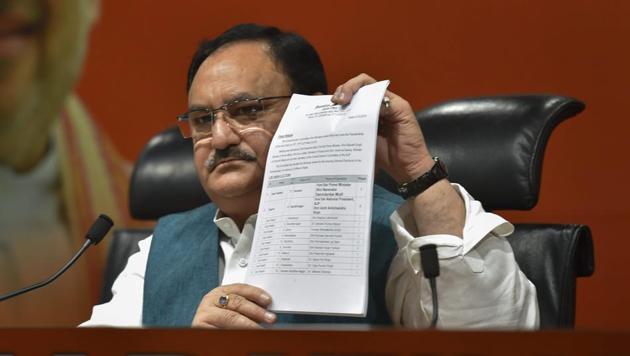 Union minister and BJP leader JP Nadda shows the first list of candidates for the upcoming Lok Sabha elections, at party office in New Delhi on March 21.(PTI Photo) Union minister and BJP leader JP Nadda shows the first list of candidates for the upcoming Lok Sabha elections, at party office in New Delhi on March 21.(PTI Photo)