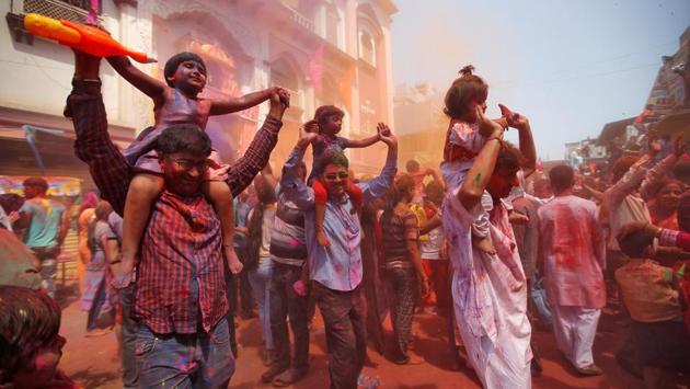 Holi, better known as Doljatra in West Bengal, was also being celebrated by the Gaudiya Vaishnavites at temple town Nabadwip. In Shantiniketan, the abode of Rabindranath Tagore, ashramites of Visva Bharati - students and teachers - took part in Basanto utsab, to herald Spring as Tagore song ‘Ore Grihobasi’ rent the air. (Rupak De Chowdhuri / REUTERS) Holi, better known as Doljatra in West Bengal, was also being celebrated by the Gaudiya Vaishnavites at temple town Nabadwip. In Shantiniketan, the abode of Rabindranath Tagore, ashramites of Visva Bharati - students and teachers - took part in Basanto utsab, to herald Spring as Tagore song ‘Ore Grihobasi’ rent the air. (Rupak De Chowdhuri / REUTERS)