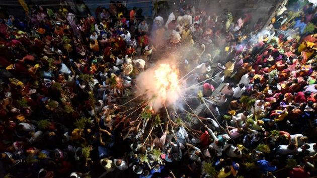 Celebrations begin a night before with Holika Dahan here seen in Patna, wherein people perform religious rituals in front of a bonfire and pray for the destruction of evil, just the way Holika, the sister of the demon king Hiranyakashipu, was killed in the fire. (PTI) Celebrations begin a night before with Holika Dahan here seen in Patna, wherein people perform religious rituals in front of a bonfire and pray for the destruction of evil, just the way Holika, the sister of the demon king Hiranyakashipu, was killed in the fire. (PTI)