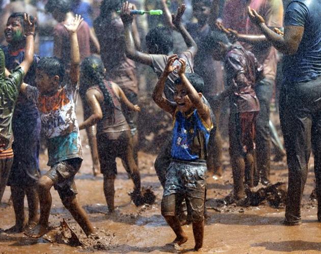 Holi helps to bring the society together and strengthen the secular fabric of our country. For, the festival is celebrated by non-Hindus also as everybody like to be a part of such a colouful and joyous festival. (RAHUL RAUT/HT PHOTO) 