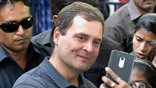 Congress president Rahul Gandhi poses for selfies by students at Stella Maris Women’s College in Chennai on March 13, 2019.(PTI)