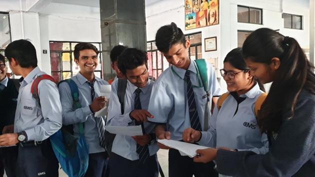 Students of City Montessori Inter College, Aliganj, Lucknow discussing ICSE Chemistry 2019 Paper held on Friday (HT)