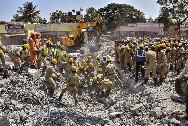 Rescue teams conduct operations after an under-construction building collapsed, at Dharwad in north Karnataka, Thursday, March 21, 2019.(PTI file photo)