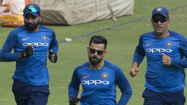 File image of India cricketer Mohammed Shami, Virat Kohli and MS Dhoni (L-R).(AP)