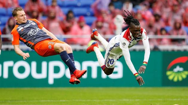 Montpellier’s Nicolas Cozza in action with Lyon’s Bertrand Traore during the Olympique Lyonnais v Montpellier Ligue 1 match at Groupama Stadium, Lyon, France (Emmanuel Foudrot / REUTERS) Montpellier’s Nicolas Cozza in action with Lyon’s Bertrand Traore during the Olympique Lyonnais v Montpellier Ligue 1 match at Groupama Stadium, Lyon, France (Emmanuel Foudrot / REUTERS)