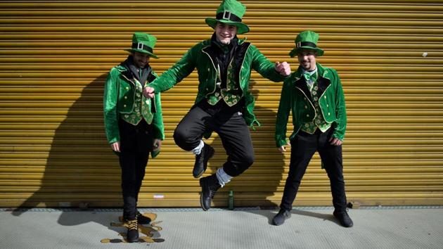 Revellers attend the Saint Patrick’s Day parade in Dublin, Ireland. According to legend Saint Patrick used the three-leaved shamrock to explain the Holy Trinity to Irish pagans in the 5th-century after becoming a Christian missionary. (Charles McQuillan / Getty Images) Revellers attend the Saint Patrick’s Day parade in Dublin, Ireland. According to legend Saint Patrick used the three-leaved shamrock to explain the Holy Trinity to Irish pagans in the 5th-century after becoming a Christian missionary. (Charles McQuillan / Getty Images)
