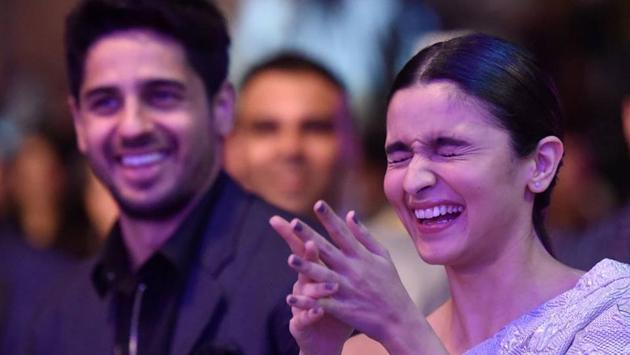 Alia Bhatt cracks up at a joke as Sidharth Malhotra looks on Alia Bhatt cracks up at a joke as Sidharth Malhotra looks on