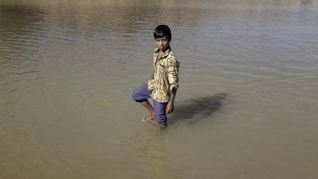 The National Program for Prevention and Control of Fluorosis (NPPCF) states that damage or change in skeletal system due to exposure to high levels of fluoride is irreversible. However, Rajib (13) has shown significant recovery over the years because of medication administered by a local NGO with a simple combination of calcium, vitamin D, magnesium and zinc. (WaterAid / Proneet De Kashyap)