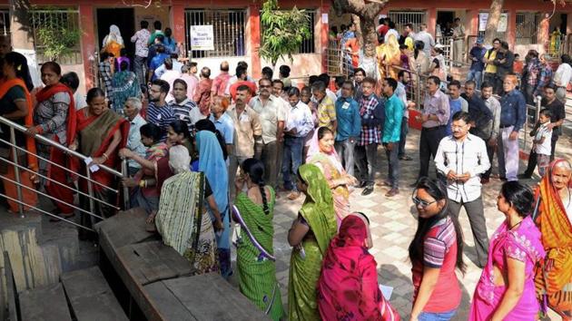 Voters stand in a queue at a polling station to cast their votes. Image for representation. (PTI file photo) Voters stand in a queue at a polling station to cast their votes. Image for representation. (PTI file photo)