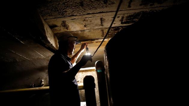Eleazar Azuaje, in-charge of looking after the water system for the apartment block, checks the water level of the main tank. President Nicolas Maduro’s government blames the scarcity on a long drought and accuses opponents of sabotaging supply. The opposition, led by Juan Guaido, says the problem is due to little maintenance done over many years on Venezuela’s power and water networks. (Carlos Garcia Rawlins / REUTERS) 