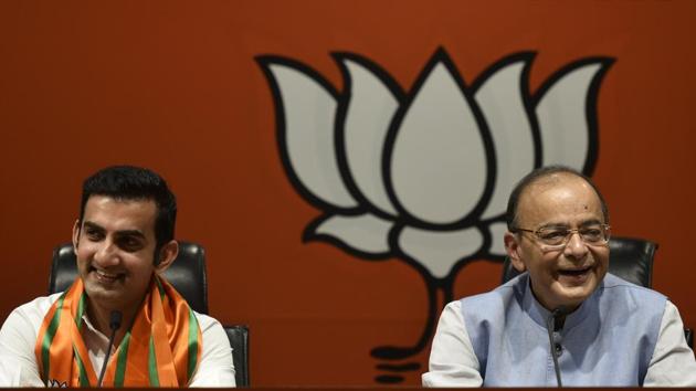 Former Indian cricketer Gautam Gambhir joins Bharatiya Janata Party in the presence of Union Finance Minister Arun Jaitley at BJP headquarters in New Delhi. (Biplov Bhuyan / HT Photo) 