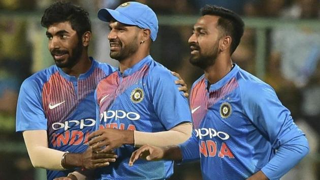 Shikhar Dhawan, Jasprit Bumrah and Krunal Pandya celebrate the dismissal of Australia's Aaron Finch. (AP) Shikhar Dhawan, Jasprit Bumrah and Krunal Pandya celebrate the dismissal of Australia's Aaron Finch. (AP)