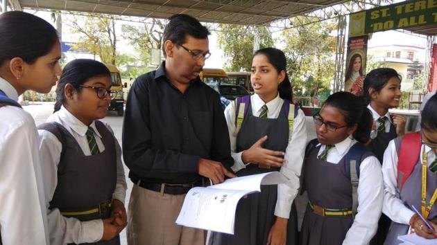 ICSE 2019 question paper analysis: Students of St Teresa’s College, Aashiana, discussing ICSE biology examination in Lucknow on Monday.(Rajeev Mullick/HT photo)