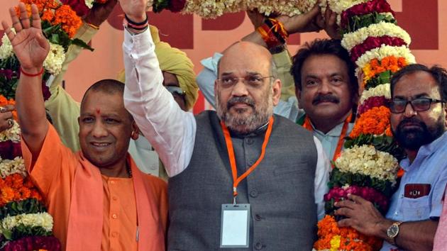 BJP national President Amit Shah with Uttar Pradesh Chief Minister Yogi Adityanath during an election rally in Agra, Sunday, March 24, 2019.(PTI) BJP national President Amit Shah with Uttar Pradesh Chief Minister Yogi Adityanath during an election rally in Agra, Sunday, March 24, 2019.(PTI)