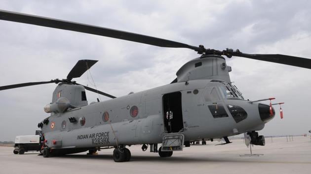 Air Chief Marshal BS Dhanoa on Monday formally inducted four US-made Chinook heavy-lift helicopters at Air Force Station 12 Wing in Chandigarh. Two hangars and logistics facilities were created in Chandigarh for the Chinook helicopters. Each Chinook helicopter has a payload capacity of about 10 tonne which is a major boost to India’s strategic airlift capability. (Keshav Singh / HT Photo) Air Chief Marshal BS Dhanoa on Monday formally inducted four US-made Chinook heavy-lift helicopters at Air Force Station 12 Wing in Chandigarh. Two hangars and logistics facilities were created in Chandigarh for the Chinook helicopters. Each Chinook helicopter has a payload capacity of about 10 tonne which is a major boost to India’s strategic airlift capability. (Keshav Singh / HT Photo)