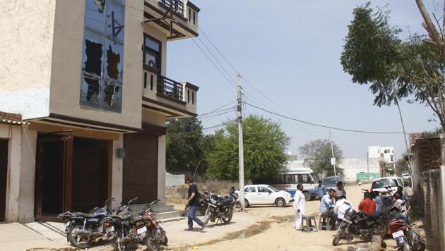 An uneasy calm prevailed in Bhoop Singh Nagar colony of Dhumaspur village, which is under the watch of police, three days after a mob had assaulted at least 12 members of a Muslim family in the village . (Yogendra Kumar/HT PHOTO) An uneasy calm prevailed in Bhoop Singh Nagar colony of Dhumaspur village, which is under the watch of police, three days after a mob had assaulted at least 12 members of a Muslim family in the village . (Yogendra Kumar/HT PHOTO)