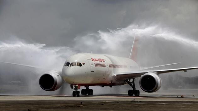 Air India has decided to withdraw boarding passes with photographs of PM Narendra Modi and Gujarat chief minister Vijay Rupani after a passenger complained about it on Monday morning, saying it violated the model code of conduct. Shashi Kant, the former director general of police of Punjab had tweeted a photograph of his boarding pass issued at the New Delhi airport. (Satish Bate / HT Archive) Air India has decided to withdraw boarding passes with photographs of PM Narendra Modi and Gujarat chief minister Vijay Rupani after a passenger complained about it on Monday morning, saying it violated the model code of conduct. Shashi Kant, the former director general of police of Punjab had tweeted a photograph of his boarding pass issued at the New Delhi airport. (Satish Bate / HT Archive)