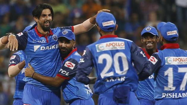Delhi Capitals Ishant Sharma, left, celebrates with his teammates the dismissal of Mumbai Indians' Quinton de Kock. (AP) Delhi Capitals Ishant Sharma, left, celebrates with his teammates the dismissal of Mumbai Indians' Quinton de Kock. (AP)