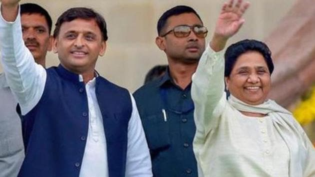 Bengaluru: Samajwadi Party leader Akhilesh Yadav with Bahujan Samaj Party leader Mayawati wave at the crowd during the swearing-in ceremony of JD(S)-Congress coalition government, in Bengaluru, on Wednesday. (PTI Photo/Shailendra Bhojak) (PTI5_23_2018_000199B) (PTI) Bengaluru: Samajwadi Party leader Akhilesh Yadav with Bahujan Samaj Party leader Mayawati wave at the crowd during the swearing-in ceremony of JD(S)-Congress coalition government, in Bengaluru, on Wednesday. (PTI Photo/Shailendra Bhojak) (PTI5_23_2018_000199B) (PTI)