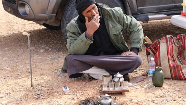For hours he wanders across the desert by foot or in his pickup truck, covering dozens of kilometres. “It’s like a therapy, a way to purify myself from the chaos of the city,” he added as he took a drag from a cigarette outside a tent he pitched in the desert after a day’s work. “It’s a beautiful place, and rough, and you feel so isolated here.” (AFP) For hours he wanders across the desert by foot or in his pickup truck, covering dozens of kilometres. “It’s like a therapy, a way to purify myself from the chaos of the city,” he added as he took a drag from a cigarette outside a tent he pitched in the desert after a day’s work. “It’s a beautiful place, and rough, and you feel so isolated here.” (AFP)