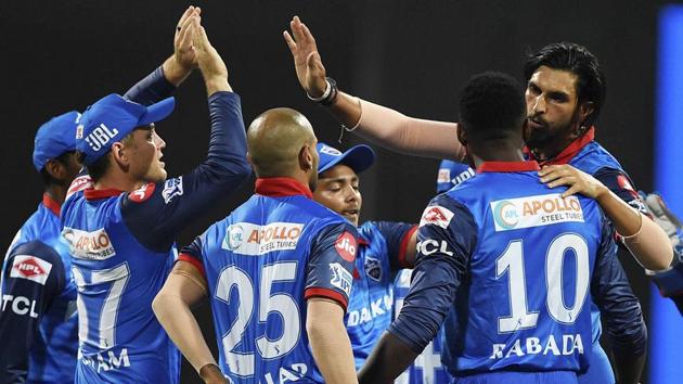Delhi Capitals players celebrate the dismissal of Mumbai Indians batsman Rohit Sharma.(PTI)