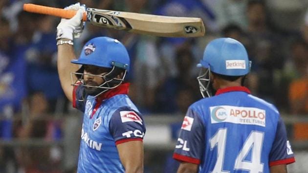 Delhi Capitals Rishabh Pant, left, raises his bat after scoring 50 runs. (AP) Delhi Capitals Rishabh Pant, left, raises his bat after scoring 50 runs. (AP)