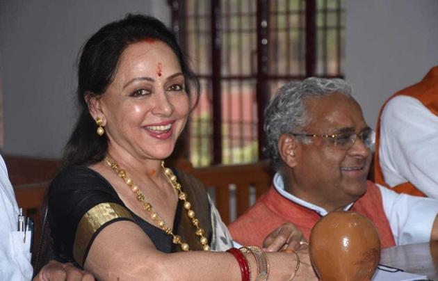 Hema, who is seeking re-election, was accompanied by UP chief minister Yogi Adityanath.(HT Photo)