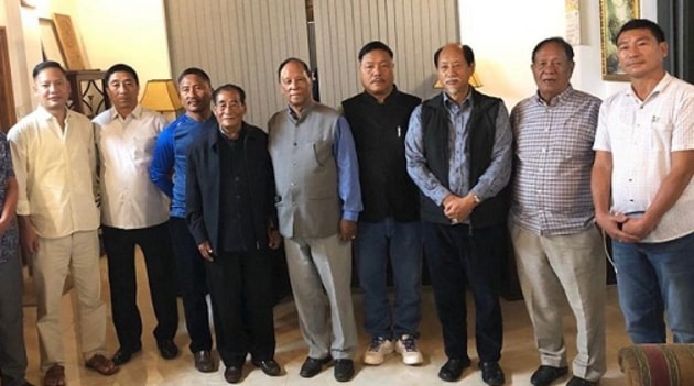 Six rebel MLAs of teh NPF with Nagaland chief minister Neiphiu Rio (third from right) and NDPP MP Tokheho Yepthomi (third from left) in Kohima on Monday. (HT PHOTO) Six rebel MLAs of teh NPF with Nagaland chief minister Neiphiu Rio (third from right) and NDPP MP Tokheho Yepthomi (third from left) in Kohima on Monday. (HT PHOTO)