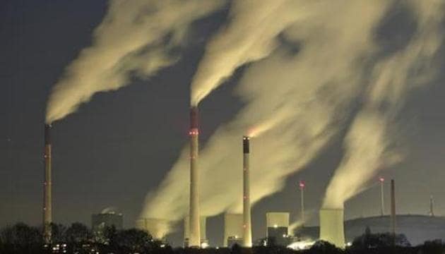 Smoke streams from the chimneys of a coal-fired power station.(AP file photo)