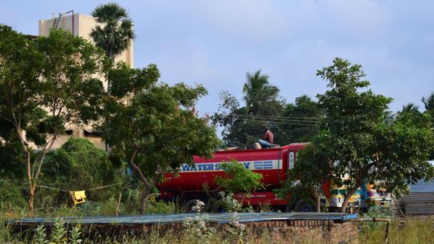 “We don’t always charge them money, sometimes we give the water to tankers for free, because we have it in abundance and the city suffers,” said Purushottaman, a 35-year-old farmer at Kakkavakkam village in Uuthakottai. The tankers sell the water in the city for up to Rs. 5,000 a load. Around 500 tankers leave the village a day in the summer, the farmers say. (Gayatri Jayaraman / HT Photo) “We don’t always charge them money, sometimes we give the water to tankers for free, because we have it in abundance and the city suffers,” said Purushottaman, a 35-year-old farmer at Kakkavakkam village in Uuthakottai. The tankers sell the water in the city for up to Rs. 5,000 a load. Around 500 tankers leave the village a day in the summer, the farmers say. (Gayatri Jayaraman / HT Photo)