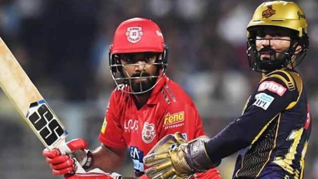 Kings XI Punjab cricketer KL Rahul plays a shot as Kolkata Knight Riders captain Dinesh Karthik looks on. (AFP) Kings XI Punjab cricketer KL Rahul plays a shot as Kolkata Knight Riders captain Dinesh Karthik looks on. (AFP)
