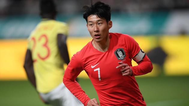 South Korea's Son Heung-min (R) celebrates his goal against Colombia.(AFP)