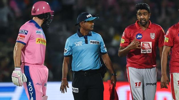 Rajasthan Royals' Jos Buttler (L) exchanges words with Kings XI Punjab's Ravichandran Ashwin (2nd R) during the 2019 Indian Premier League (IPL) match between Rajasthan Royals and Kings XI Punjab.(AFP)