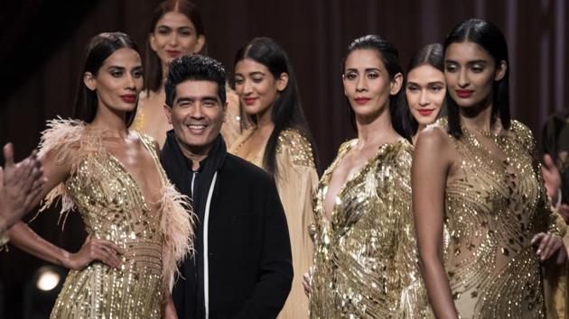 Designer Manish Malhotra and his models during HT India's Most Stylish Awards 2018. (Satish Bate/HT Photo) 