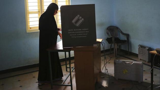 An Indian Muslim woman casts her vote at a polling station in Bangalore, India, Saturday, May 12, 2018. Image for representation. (AP file photo) An Indian Muslim woman casts her vote at a polling station in Bangalore, India, Saturday, May 12, 2018. Image for representation. (AP file photo)