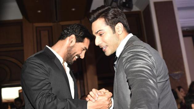 Dishoom? No, dosti! Here are actors John Abraham and Varun Dhawan giving us all some #brogoals.  (Pratik Chorge/HT Photo) 