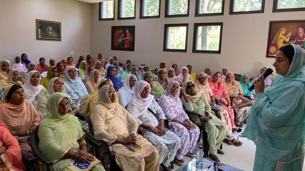 Harsimrat Kaur Badal addressing women’s wing of the Bhucho Shiromani Akali Dal (SAD) in Badal village on Thursday.(HT Photo)