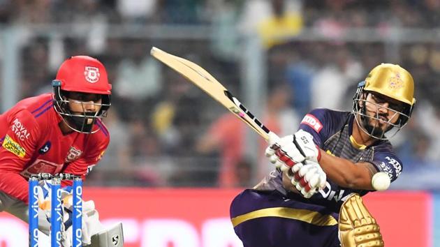 Kolkata Knight Riders’ Nitish Rana (R) plays a shot against Kings XI Punjab.(AFP)