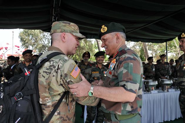 General Bipin Rawat (right), chief of army staff, meets army personnel from various African nations during the closing ceremony of the Africa-India Field Training Exercise (Afindex-2019) at the Aundh Military Station in Pune on Wednesday. (HT PHOTO) 