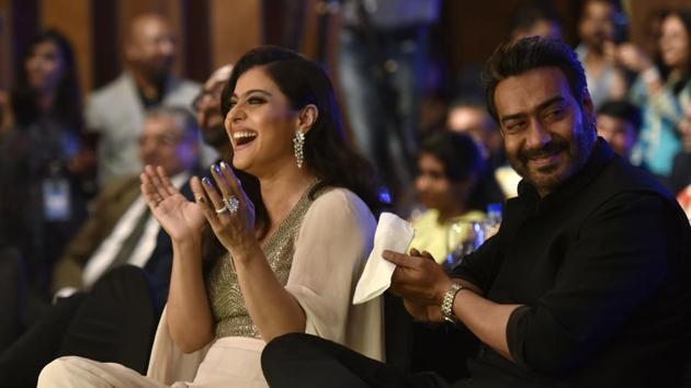 This effervescent smile will go down in history! Kajol’s cheer filled the air, as she lit up the venue along with the husband,  the dandy Ajay Devgn.  (Anshuman Poyrekar/HT Photo) 